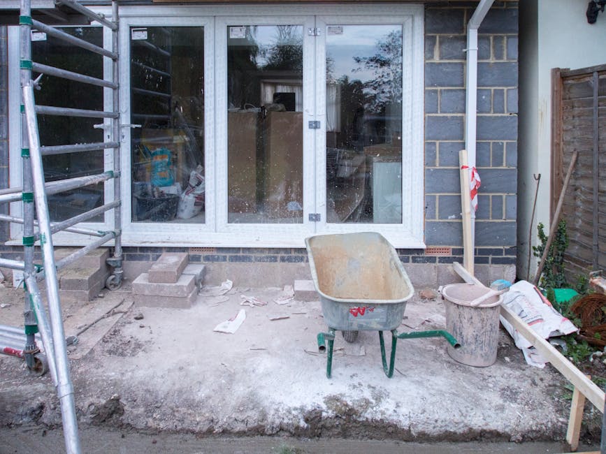 Professional renovation contractors showcasing before and after home transformation project