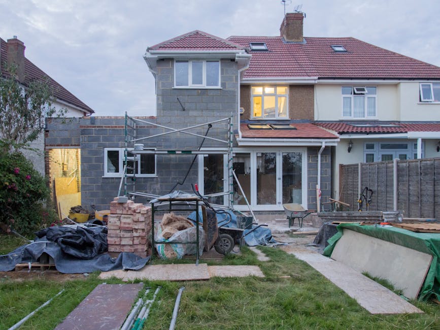 Reliable home addition contractors working on professional property management construction